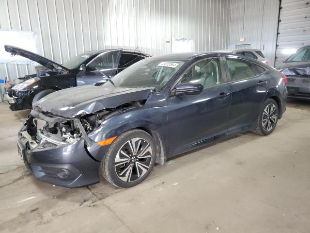 HONDA CIVIC EXL 2018 with VIN JHMFC1F76JX026301 - Photo from auction