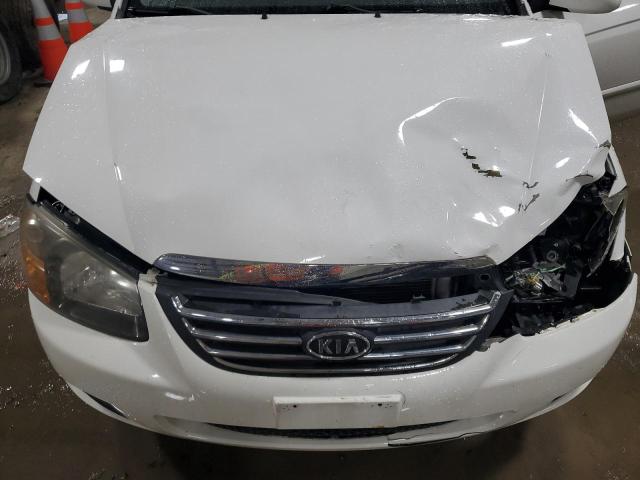 Photo 11 from auction – 2009 KIA SPECTRA EX with VIN KNAFE222095623184