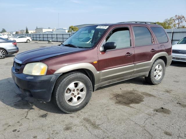 MAZDA TRIBUTE LX 2002 with VIN 4F2CU08172KM34759 - Photo from auction