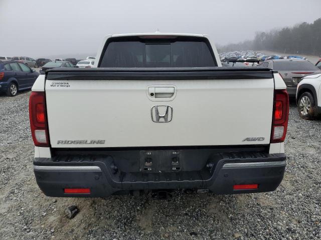 Photo 6 from auction – 2018 HONDA RIDGELINE with VIN 5FPYK3F70JB010055