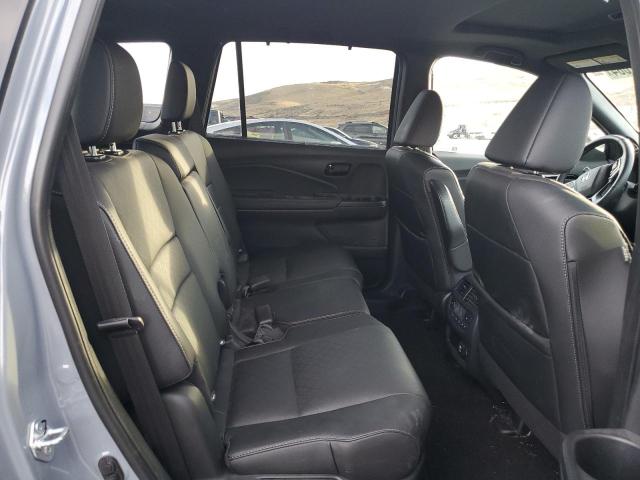 Photo 11 from auction – 2023 HONDA PASSPORT E with VIN 5FNYF8H09PB011546