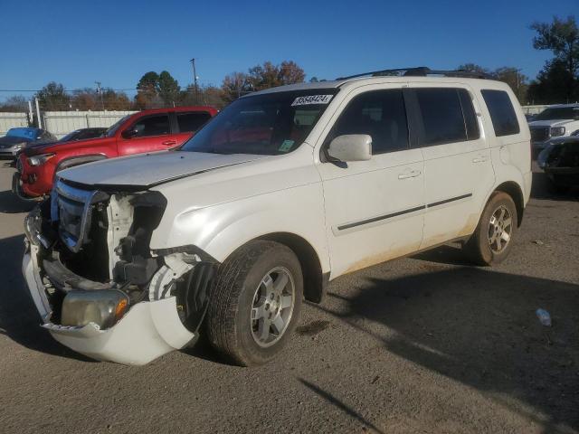 HONDA PILOT TOUR 2011 with VIN 5FNYF3H9XBB049152 - Photo from auction