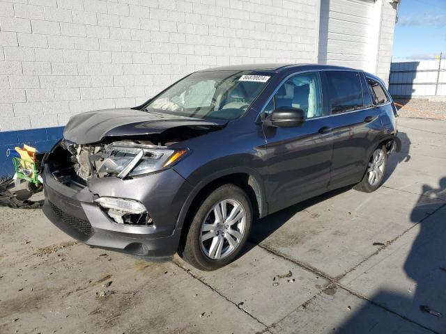 HONDA PILOT LX 2018 with VIN 5FNYF6H10JB024223 - Photo from auction