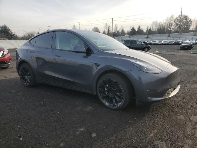 Снимка 4 от търг – 2023 TESLA MODEL Y с VIN 7SAYGDEE3PF905891
