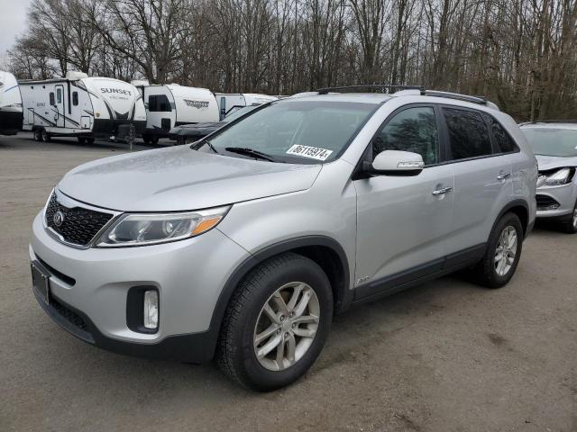 KIA SORENTO LX 2014 with VIN 5XYKTCA65EG448983 - Photo from auction