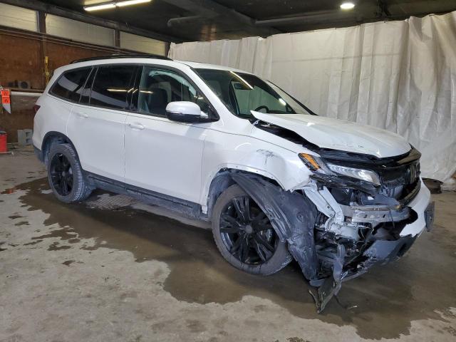 Photo 4 from auction – 2021 HONDA PILOT BLAC with VIN 5FNYF6H73MB070637