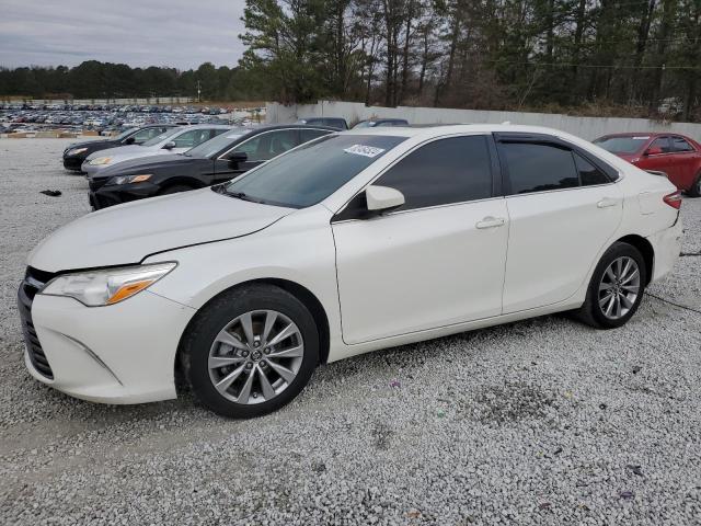 TOYOTA CAMRY LE 2017 with VIN 4T1BF1FK3HU788729 - Photo from auction