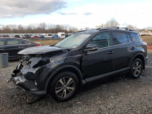 TOYOTA RAV4 XLE 2017 with VIN 2T3RFREVXHW607111 - Photo from auction