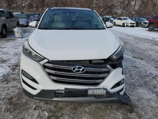 Photo 5 from auction – 2016 HYUNDAI TUCSON LIM with VIN KM8J3CA27GU031113