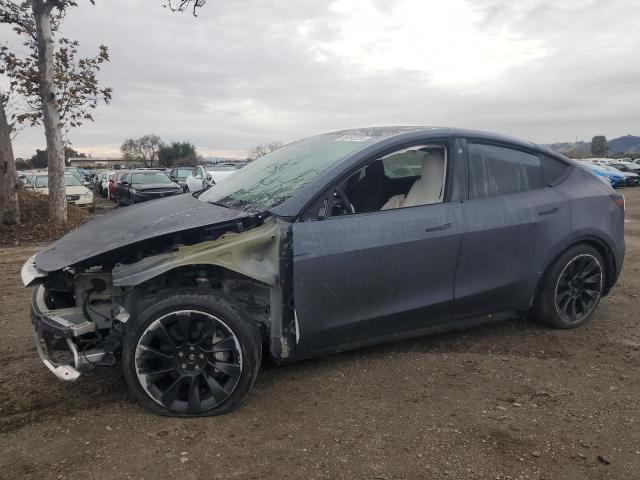 TESLA MODEL Y 2023 with VIN 7SAYGDEE7PF747104 - Photo from auction