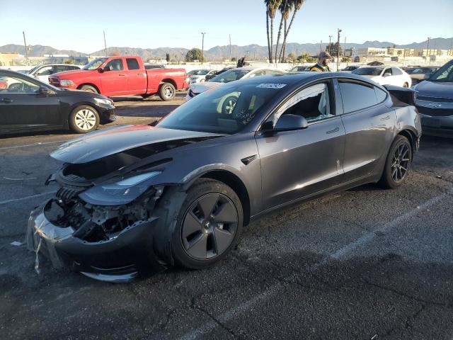 TESLA MODEL 3 2023 with VIN 5YJ3E1EAXPF610974 - Photo from auction