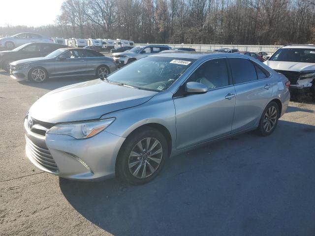 TOYOTA CAMRY LE 2017 with VIN 4T1BF1FK6HU721221 - Photo from auction