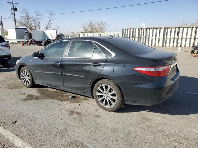 Photo 2 from auction – 2015 TOYOTA CAMRY HYBR with VIN 4T1BD1FK5FU149271