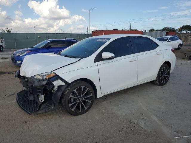 TOYOTA COROLLA L 2017 with VIN 5YFBURHE2HP621808 - Photo from auction
