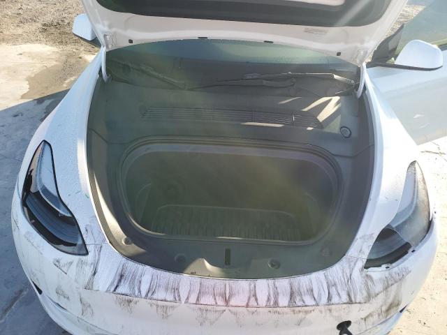 Photo 11 from auction – 2022 TESLA MODEL Y with VIN 7SAYGAEE2NF548618