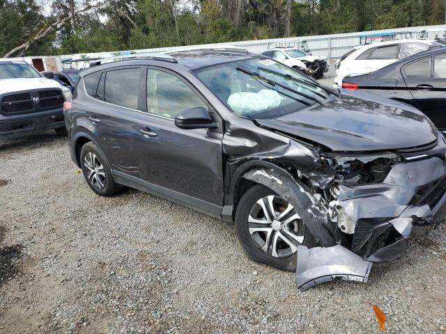 Photo 4 from auction – 2017 TOYOTA RAV4 LE with VIN JTMZFREV6HJ142809