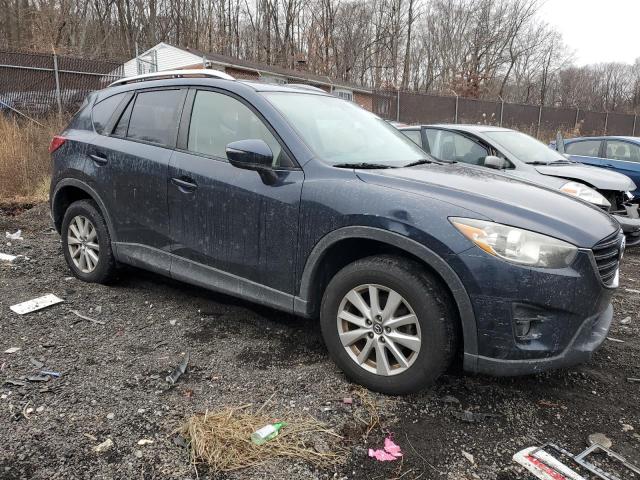 Photo 4 from auction – 2016 MAZDA CX-5 TOURI with VIN JM3KE4CY0G0755959