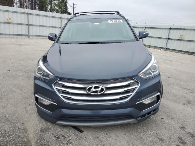 Photo 5 from auction – 2018 HYUNDAI SANTA FE S with VIN 5NMZU3LB0JH105973