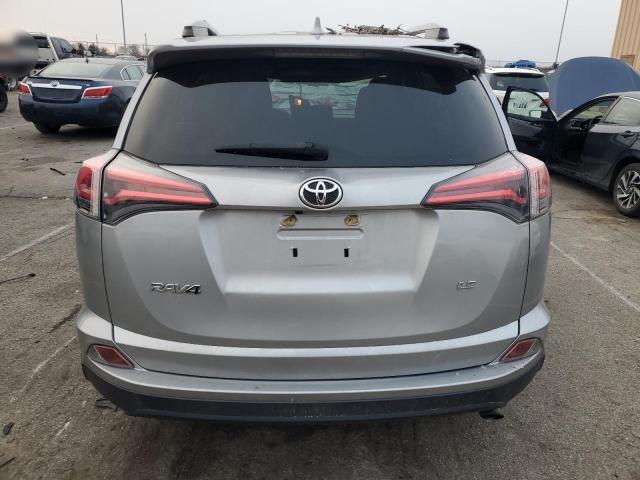 Photo 6 from auction – 2018 TOYOTA RAV4 LE with VIN JTMZFREV6JJ199291