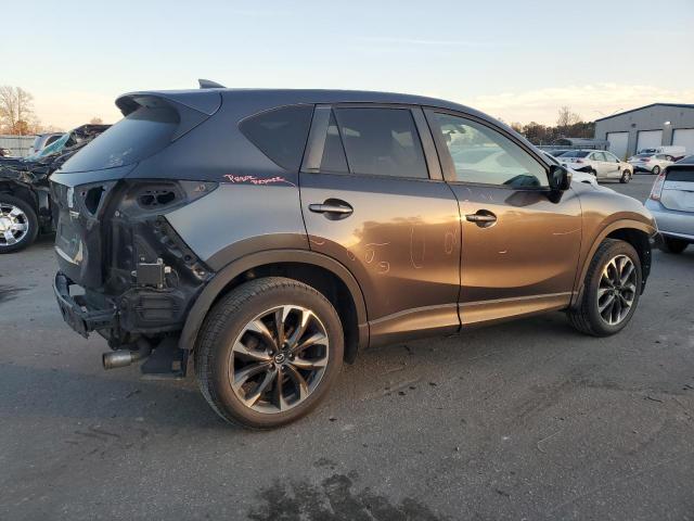 Photo 3 from auction – 2016 MAZDA CX-5 GT with VIN JM3KE2DY2G0696318