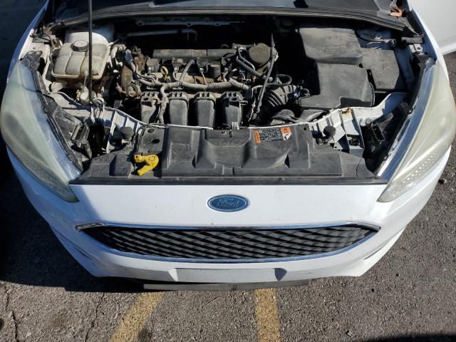Photo 11 from auction – 2015 FORD FOCUS S with VIN 1FADP3E29FL281429