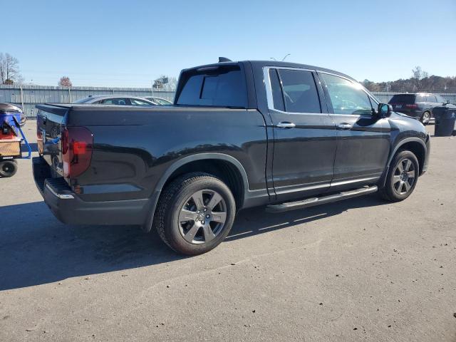 Photo 3 from auction – 2020 HONDA RIDGELINE with VIN 5FPYK3F72LB015339