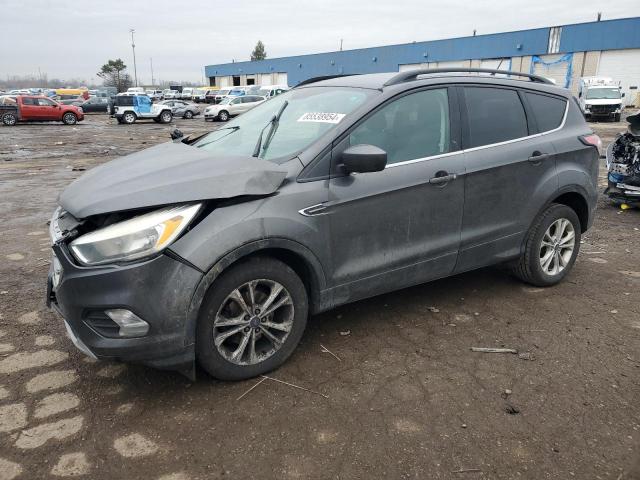 FORD ESCAPE SE 2018 with VIN 1FMCU0GD6JUA50675 - Photo from auction