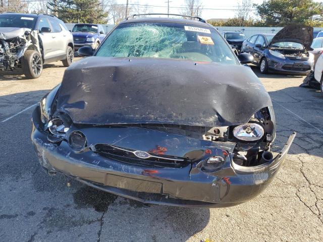 Photo 5 from auction – 1999 FORD TAURUS SE with VIN 1FAFP58SXXA234634