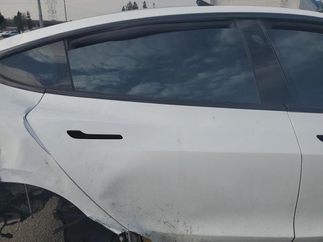 Photo 11 from auction – 2018 TESLA MODEL 3 with VIN 5YJ3E1EB3JF073851