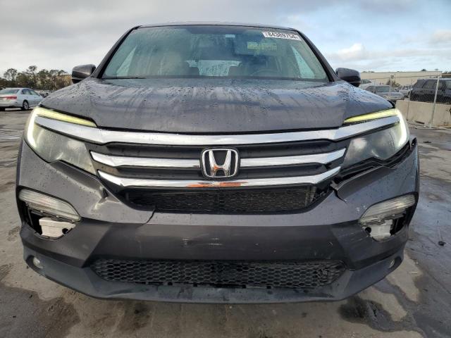Photo 5 from auction – 2018 HONDA PILOT EXL with VIN 5FNYF5H53JB013634