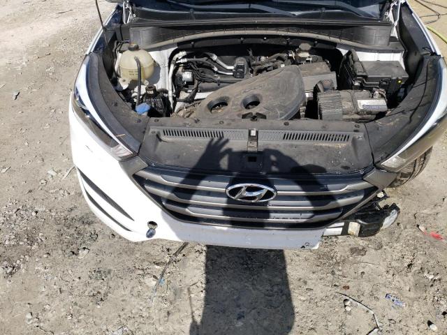 Photo 11 from auction – 2016 HYUNDAI TUCSON SE with VIN KM8J23A42GU110919