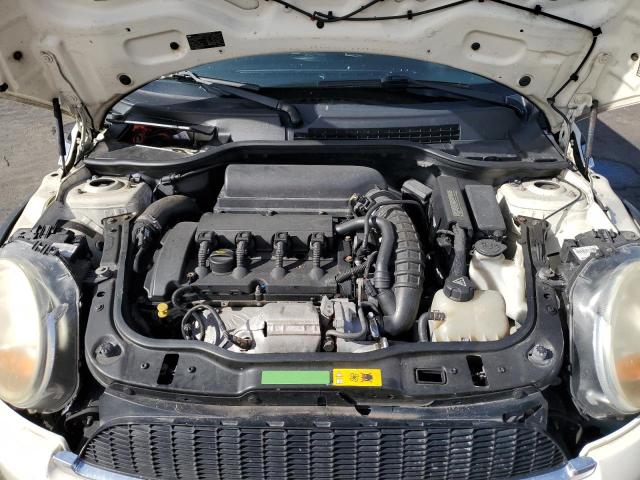 Photo 11 from auction – 2010 MINI COOPER S with VIN WMWMF7C57ATZ74202