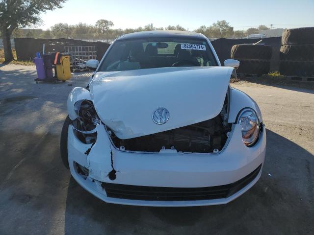 Photo 5 from auction – 2014 VOLKSWAGEN BEETLE with VIN 3VWJ17AT7EM654840