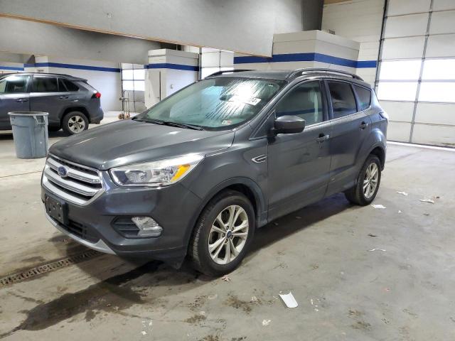 FORD ESCAPE SE 2018 with VIN 1FMCU0GD2JUD55428 - Photo from auction