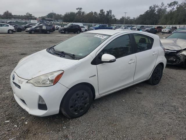 TOYOTA PRIUS C 2012 with VIN JTDKDTB39C1518662 - Photo from auction