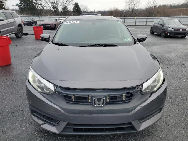 Photo 5 from auction – 2018 HONDA CIVIC EX with VIN 2HGFC2F76JH572139