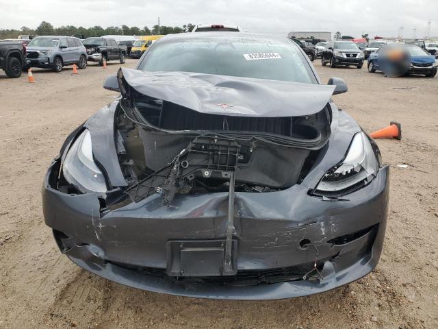 Photo 5 from auction – 2021 TESLA MODEL 3 with VIN 5YJ3E1EA2MF976228