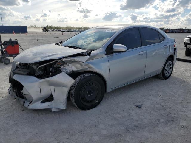 TOYOTA COROLLA L 2018 with VIN 5YFBURHE7JP854329 - Photo from auction
