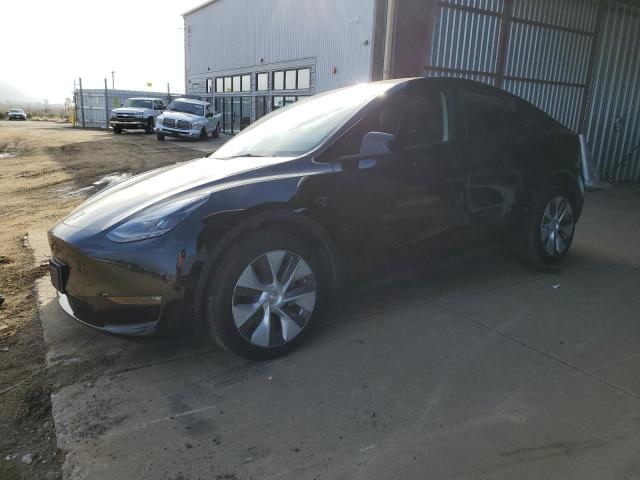 TESLA MODEL Y 2023 with VIN 7SAYGAEE7PF929111 - Photo from auction