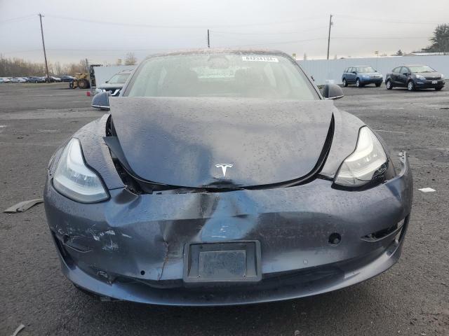 Photo 5 from auction – 2018 TESLA MODEL 3 with VIN 5YJ3E1EA4JF117959
