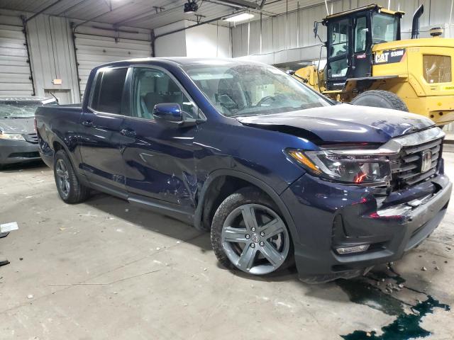 Photo 4 from auction – 2023 HONDA RIDGELINE with VIN 5FPYK3F59PB039433