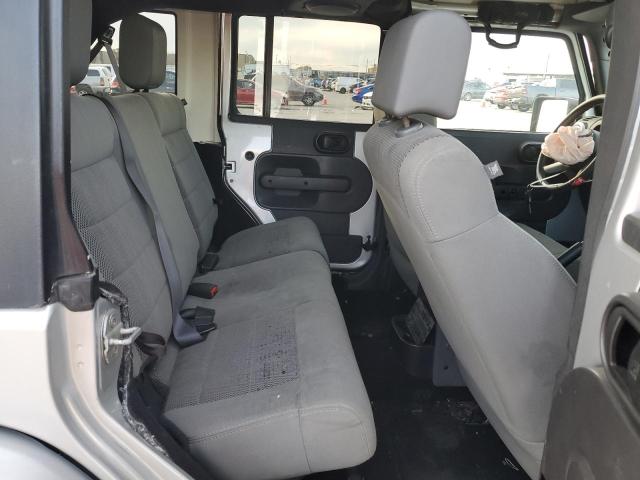 Photo 11 from auction – 2009 JEEP WRANGLER U with VIN 1J4GB59129L756288
