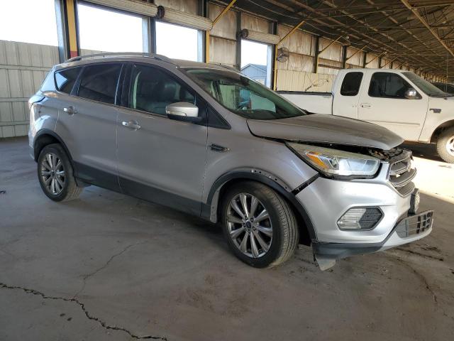 Photo 4 from auction – 2017 FORD ESCAPE TIT with VIN 1FMCU0J91HUA63199