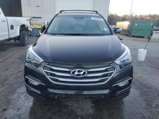 Photo 5 from auction – 2017 HYUNDAI SANTA FE S with VIN 5NMZU3LB7HH008280