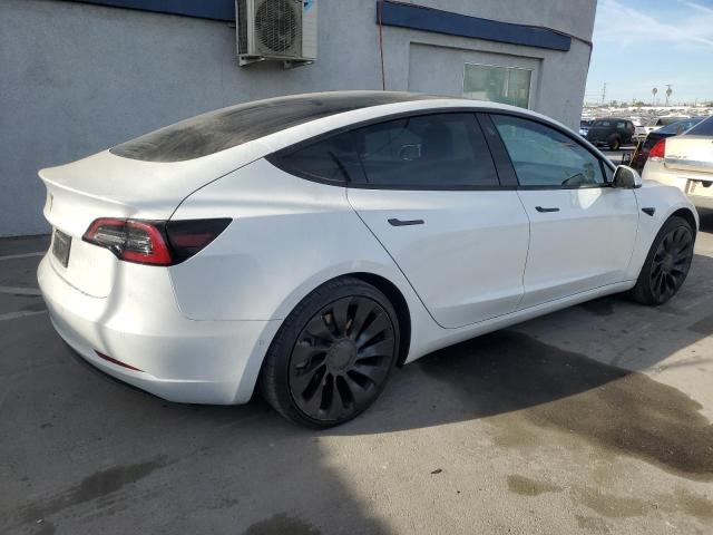 Photo 3 from auction – 2021 TESLA MODEL 3 with VIN 5YJ3E1EA5MF090694