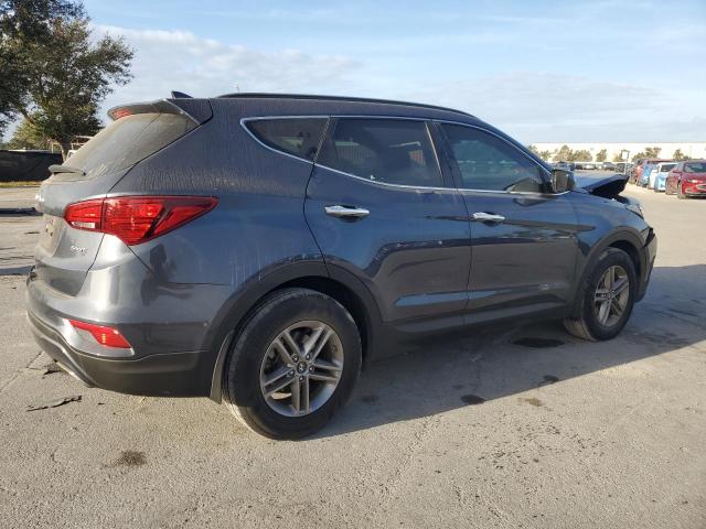Photo 3 from auction – 2017 HYUNDAI SANTA FE S with VIN 5NMZU3LB0HH015328