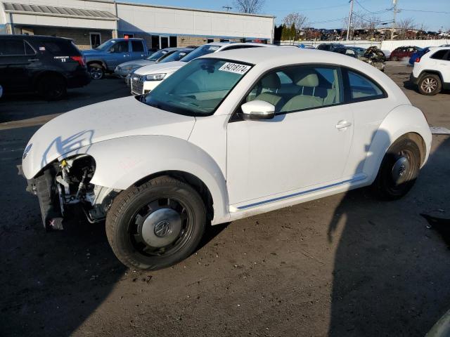 VOLKSWAGEN BEETLE 2014 with VIN 3VWJP7AT8EM610831 - Photo from auction