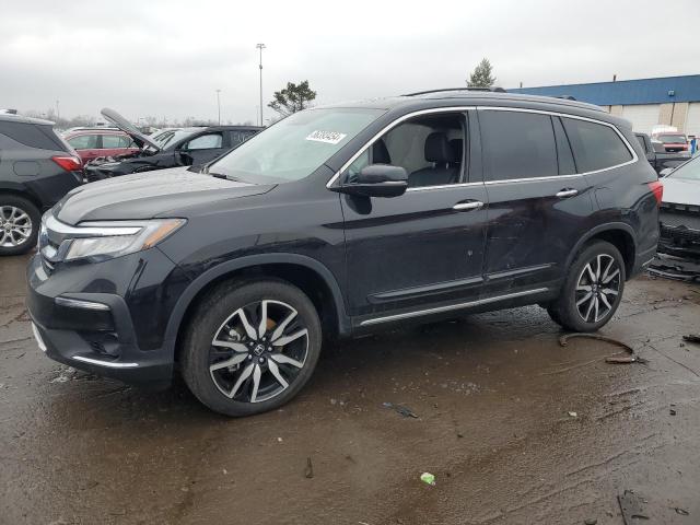 HONDA PILOT ELIT 2021 with VIN 5FNYF6H08MB048992 - Photo from auction