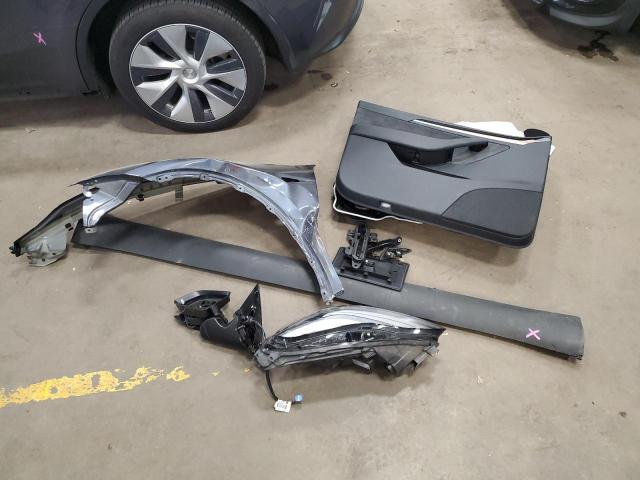 Photo 13 from auction – 2023 TESLA MODEL Y with VIN 7SAYGDEE6PA198301