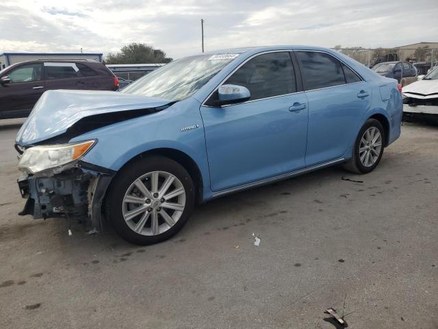 TOYOTA CAMRY HYBR 2012 with VIN 4T1BD1FK4CU030736 - Photo from auction